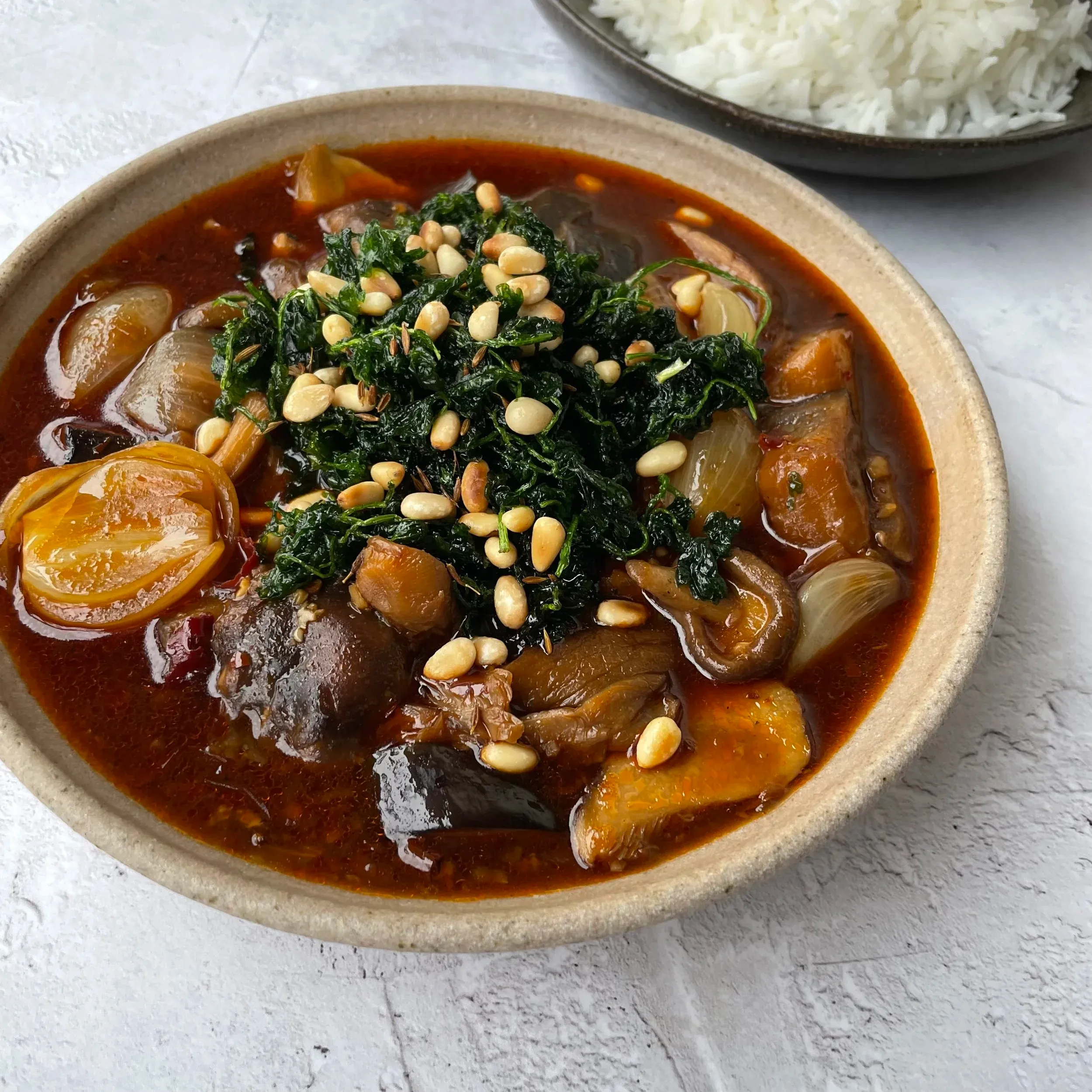 Mushroom, shallot, aubergine and fermented black bean stew, pine nuts and crispy kale